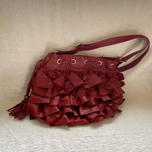 Fun ruffled, tasseled bag 12 h x 15 w